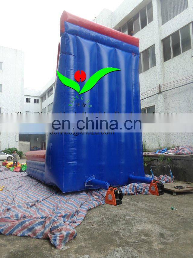 Inflatable climbing wall with obstacle course