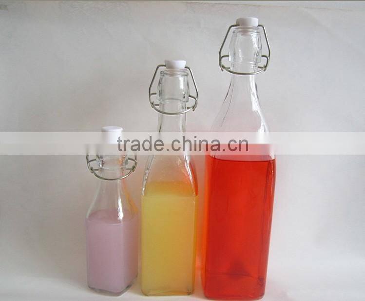 Food grade drinking swing top glass water bottle with stoppers