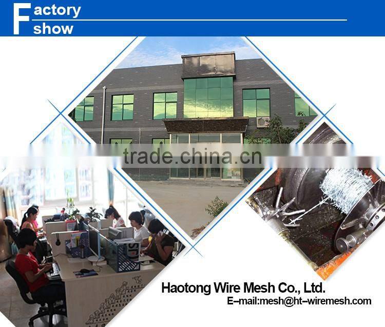 Chain link fence top barbed wire