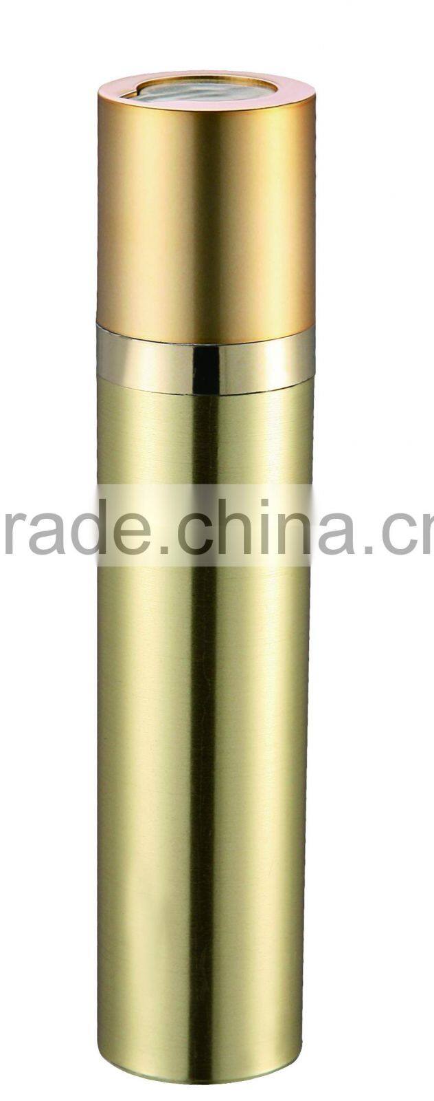 golden metal clothed airless bottle