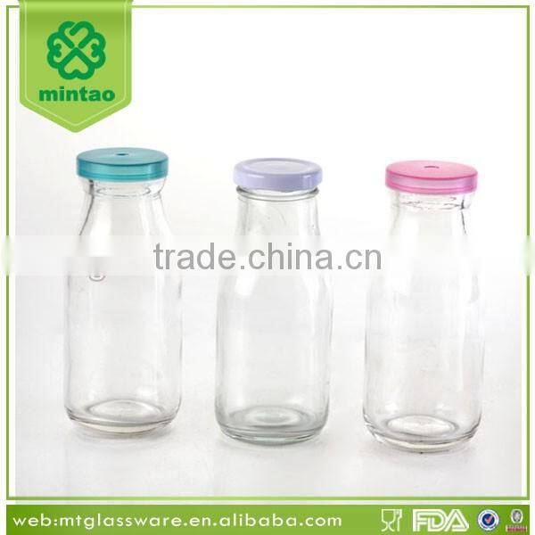 display box packing small glass bottles with lids and paper straw