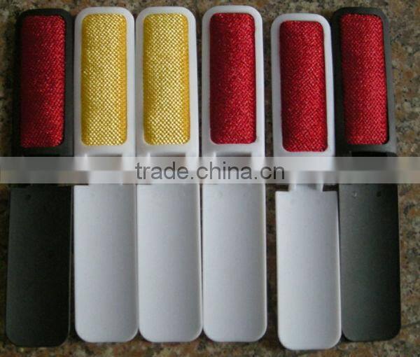 Plastic travelling lint brush