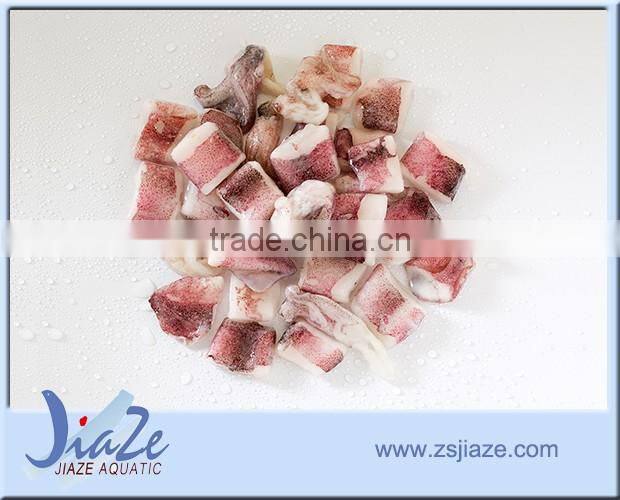 cutting baby squid loligo