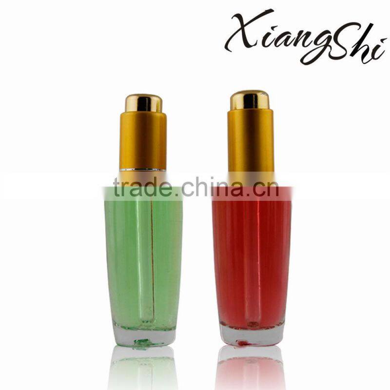 transparent oval glass essential oil bottle with pump