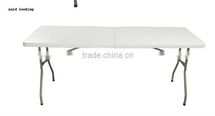 6-foot center-fold multipurpose table with carrying handle and lock