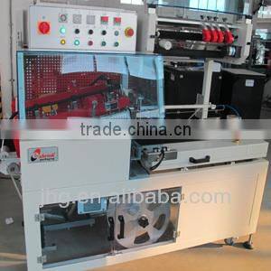 Automatic L-bar shrink wrap machine