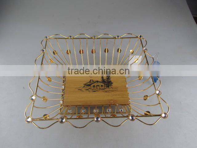 square golden iron fruit basket with wooden board