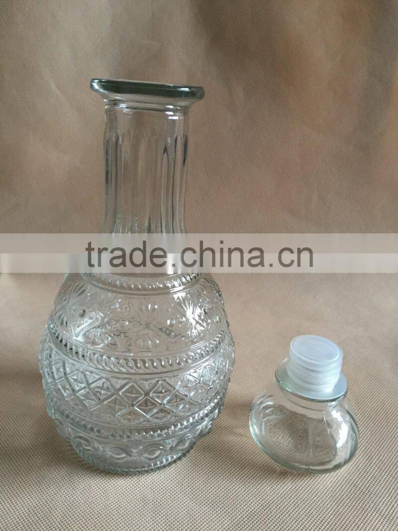 Beautiful glass wine bottle , glass bottle , glass bottle with lid , glassware
