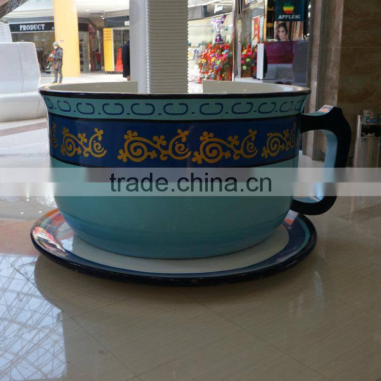 Large fiberglass coffee cup chair