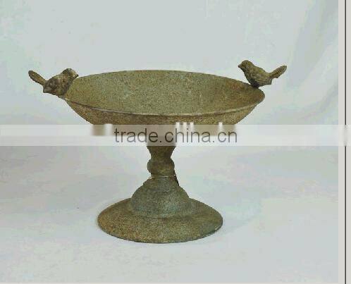 Antique metal garden bird feeder with stand