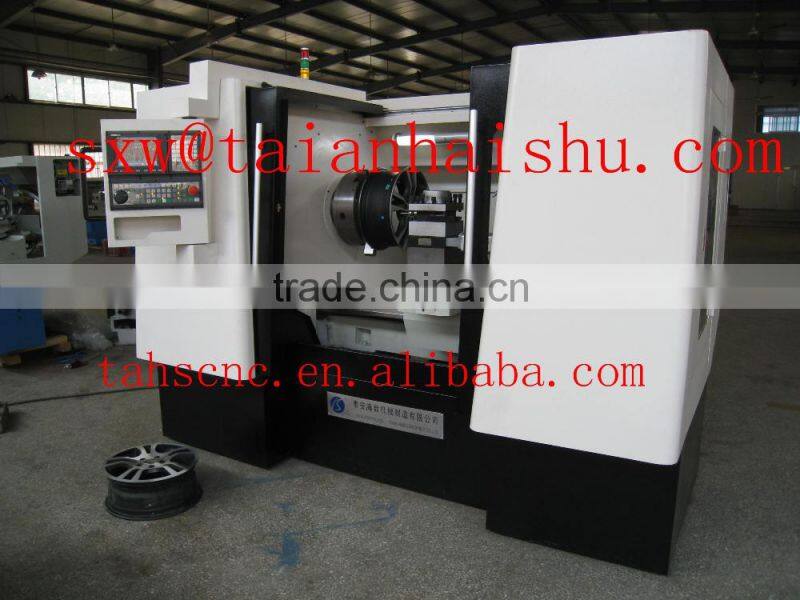 Horizontal flat bed wheel repair machine