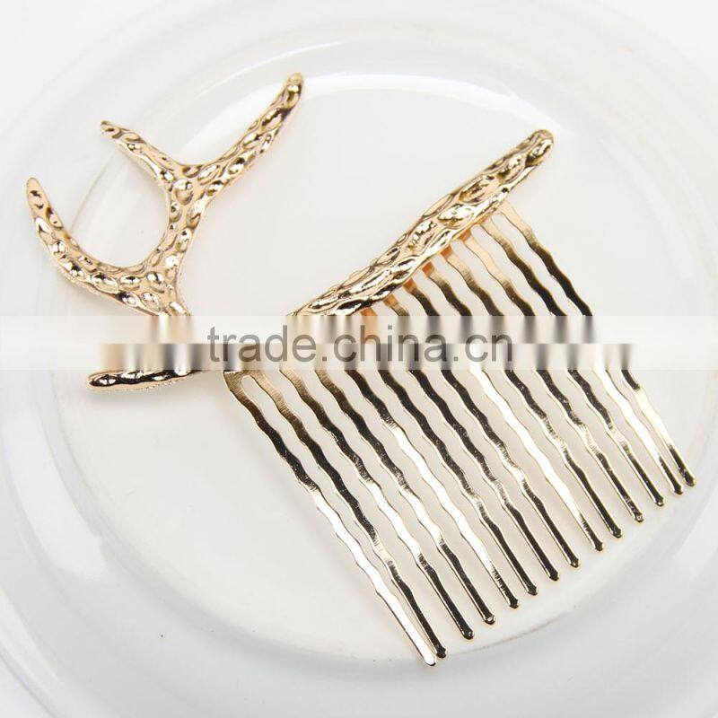 Stag Gold tone hair comb