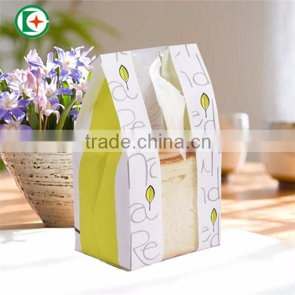 Paper bag with plastic window which be used to take bread and hamburger