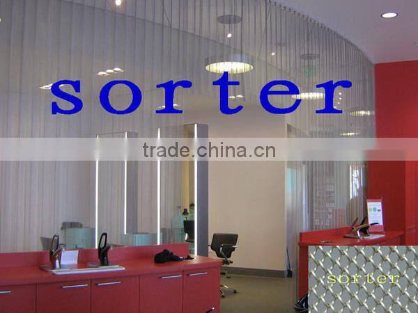 Sorter's wall covering curtain hanging woven wire mesh