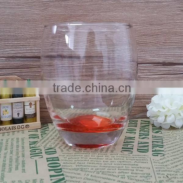 Clear egg shape glass tumbler with 400ML capacity and color bottom