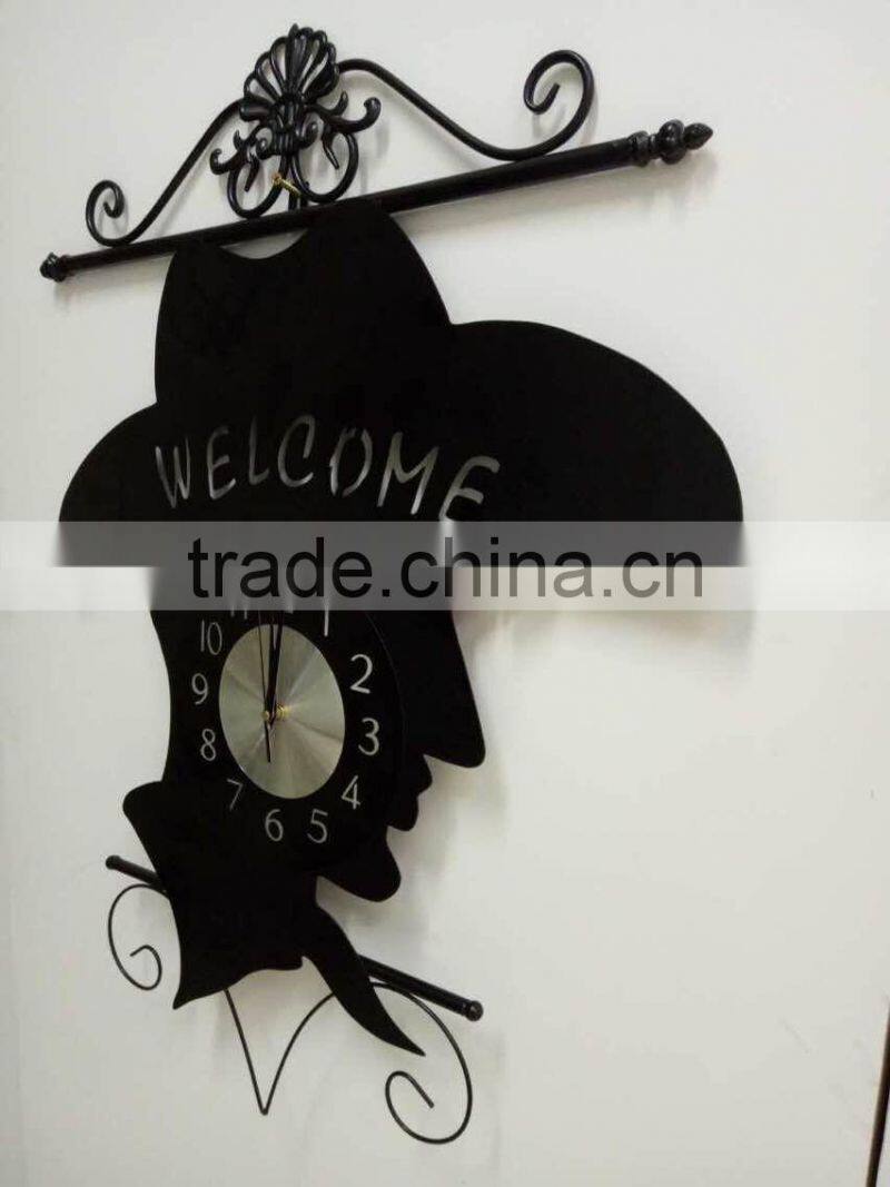 Hot sale black color figure head decorative metal wall mounted clock