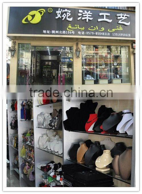 Delicate woden bust jewelry display