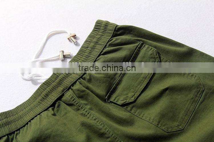 Mens green pocket inside hem zipper woven fashion pants