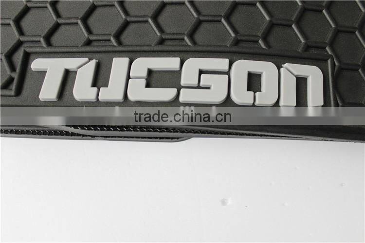 connected rear pieces with buttons for Hyundai Tucson custom car mat