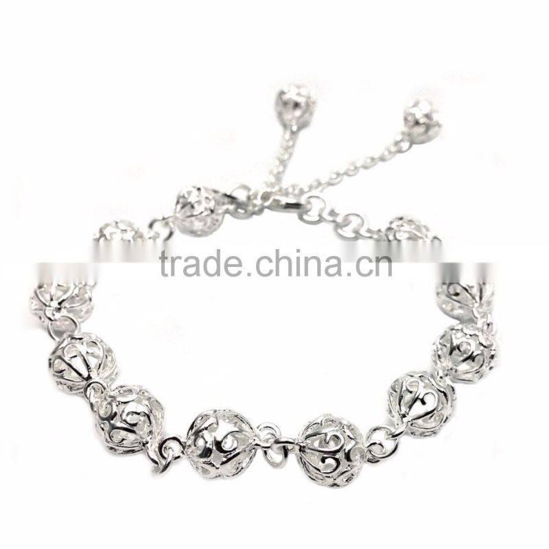 featuring gold plated detail and loop design open bangle