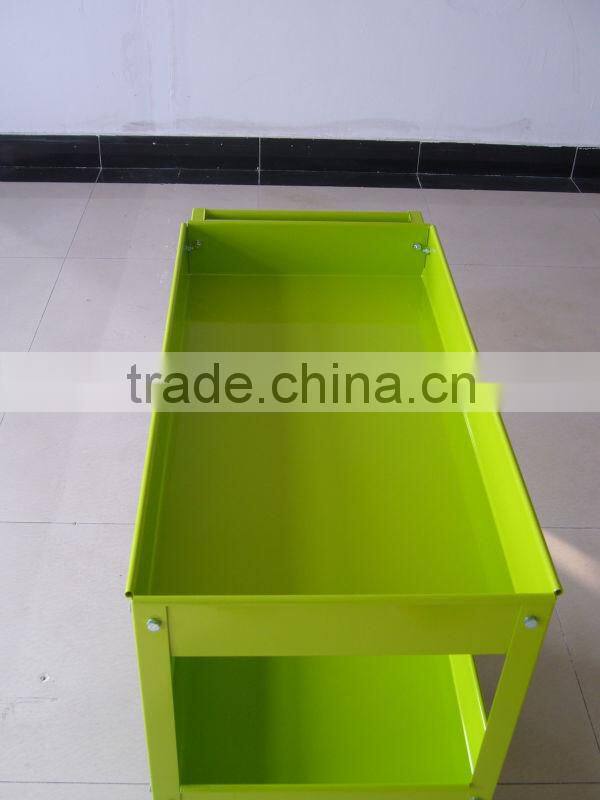 green tool trolley with handle and wheels
