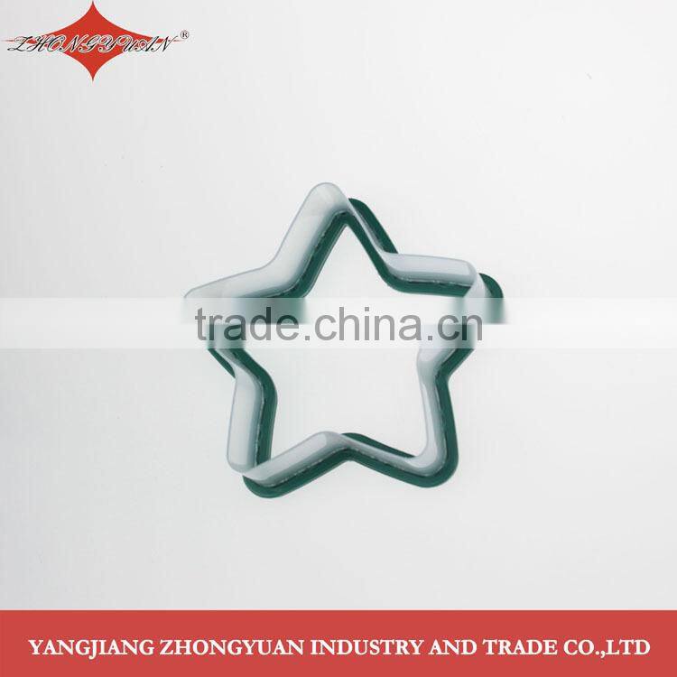Star shape plastic cookie cutter with TPR grip