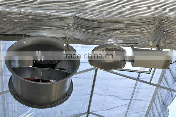 Greenhouse cooling pad and fan