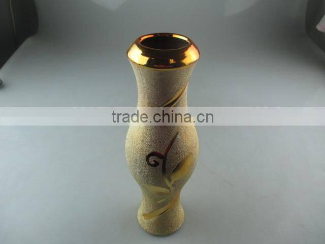 beautiul golden porcelain type vase with flower design