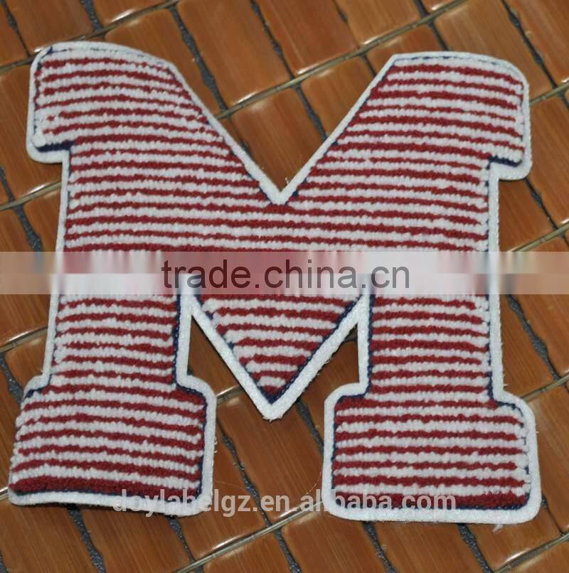 Chinese factory bulk produced woven badges