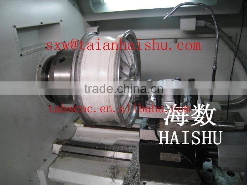 Horizontal flat bed wheel repair machine