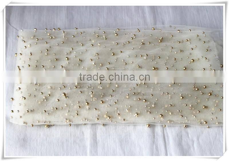New arrival Transparent tulle soft beige net fabric with gold beads for Girl's dress