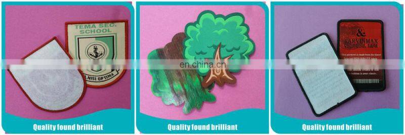 Heat transfer woven label for children's garment and toy