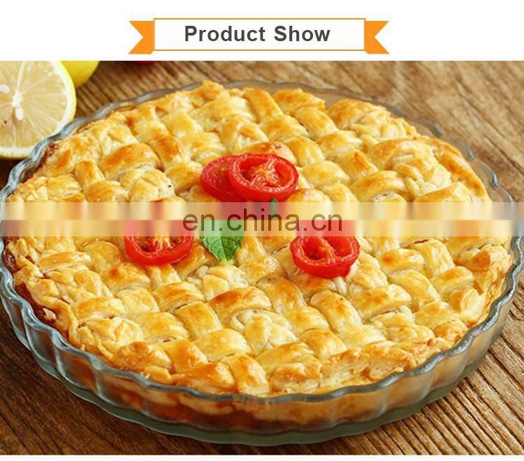 A Round Of Heat Resistant Glass Pizza Baking Dish