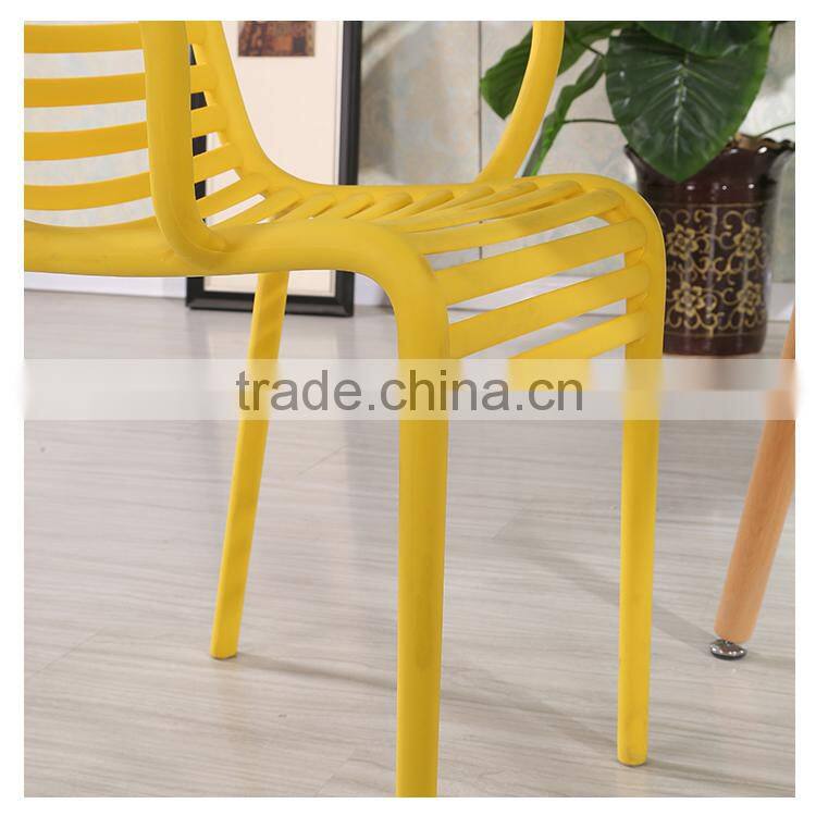 Used plastic armrest dining chairs