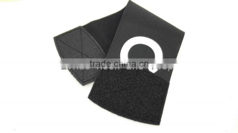 Hook and loop armband with logo