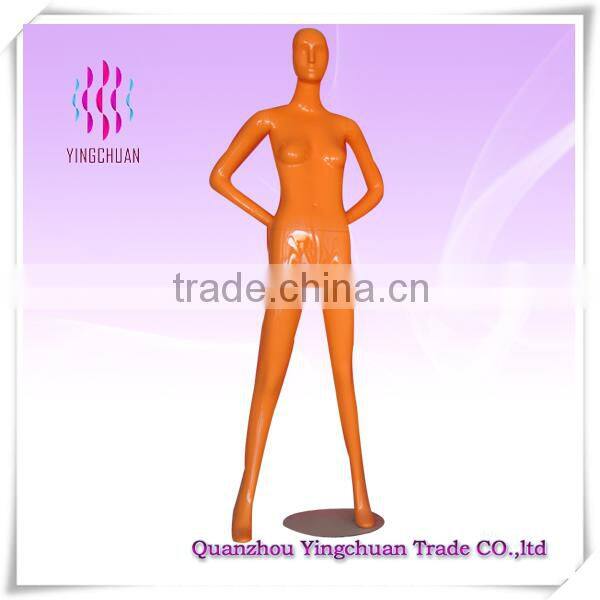 Window display standing fashion pink female mannequin