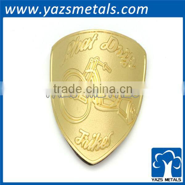 curved bicycle gold head badge