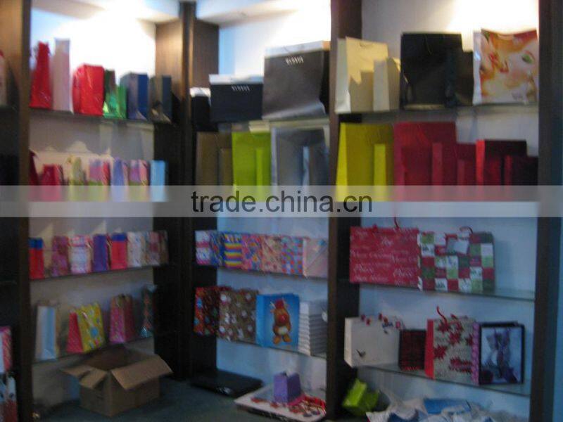 Beauty paper gift bag with polyester rope, pink print and nice design,OEM orders are welcome