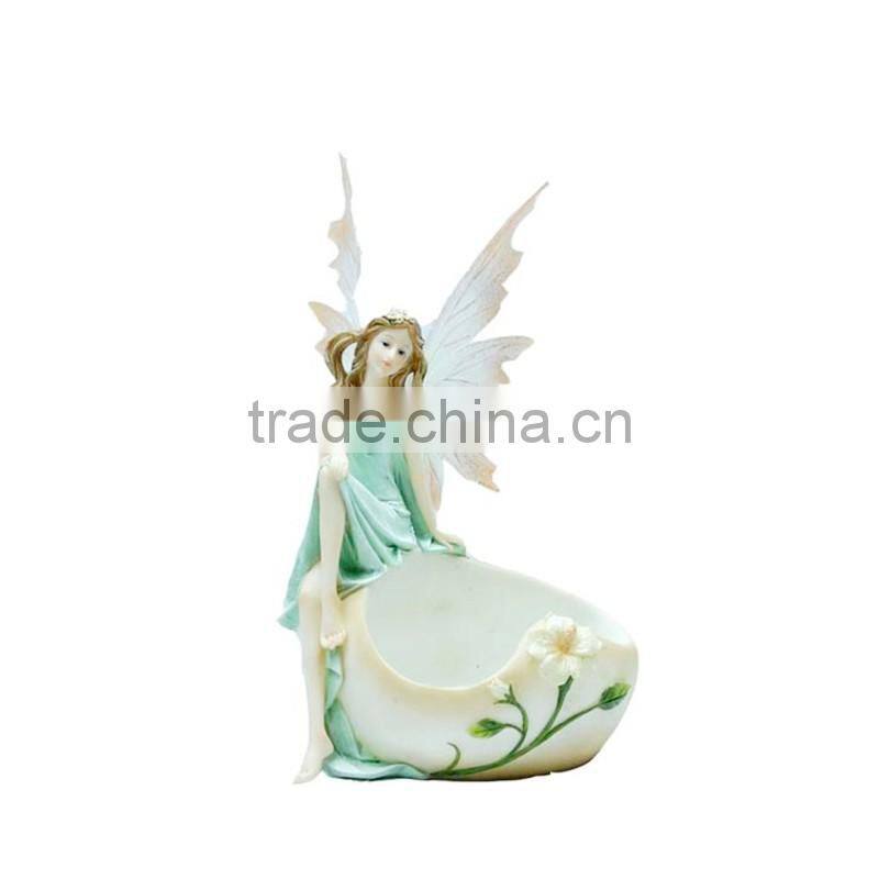 polyresin fairy sitting