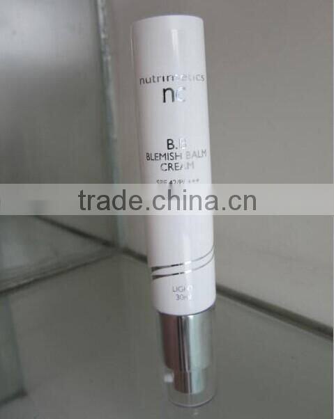 Chinese colored cosmetic soft tube oriented flip flop cap