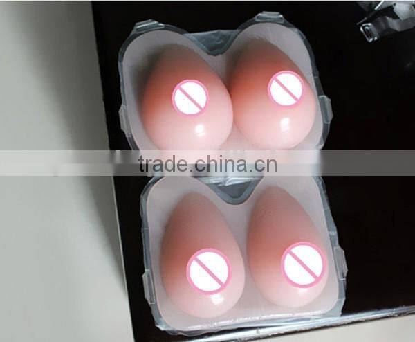 600g-2000g per pairs pink beige transparent brown color avaliable one piece silicone breast forms China Supplier good services