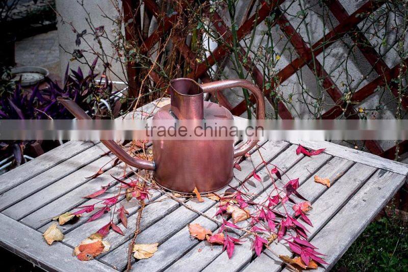 round galvanized metal antiqued watering can