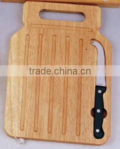 wooden bread board with knife