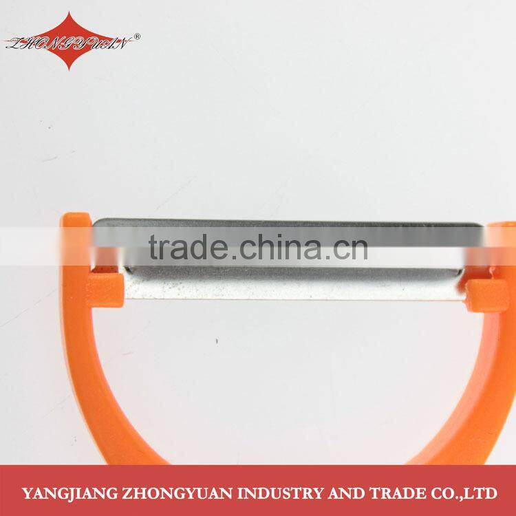 Multipurpose peeler with fish-shaped ABS handle