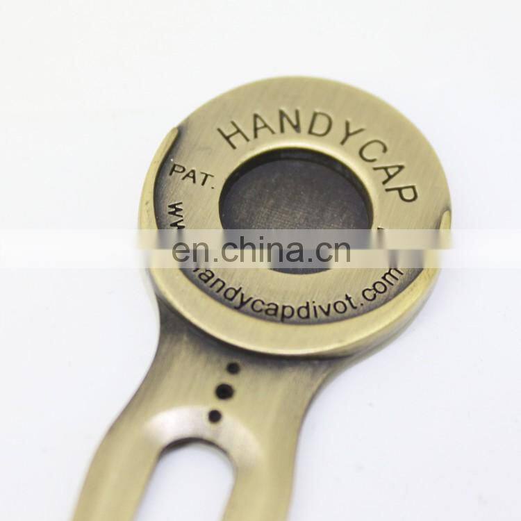 metal golf divot repair tool with golf ball marker