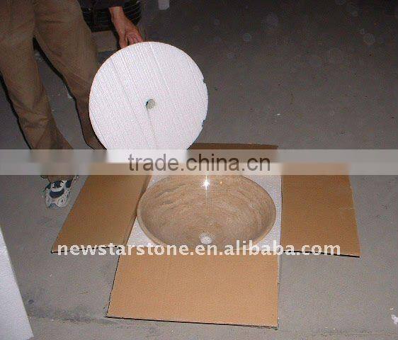 white marble vessel sinks