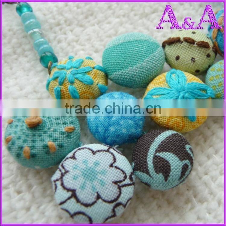 Snap fastener fabric covered button