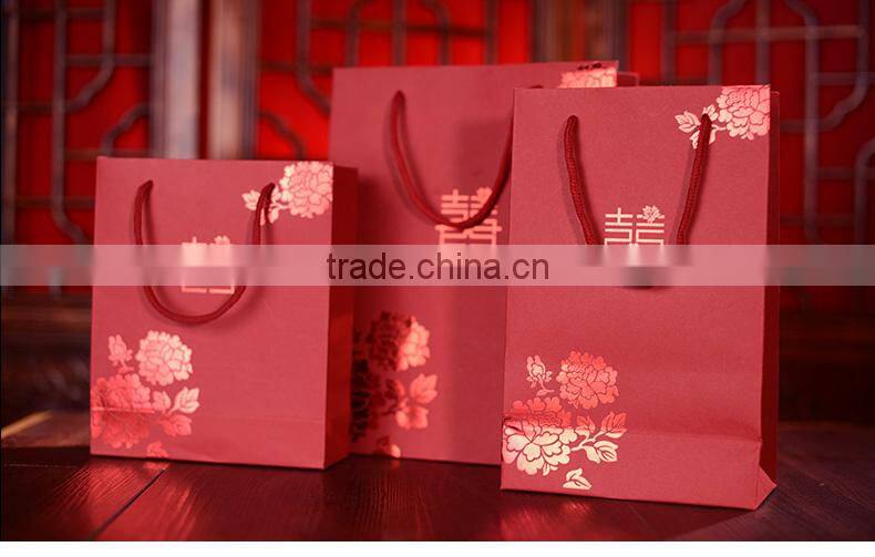 Customized China manufactures printing wedding gift paper bag