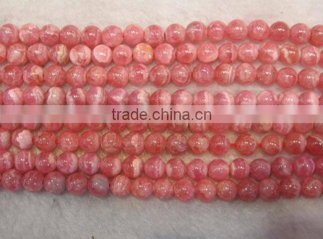 natural B grade Argentina Rhodochrosite round beads in loose gemstone