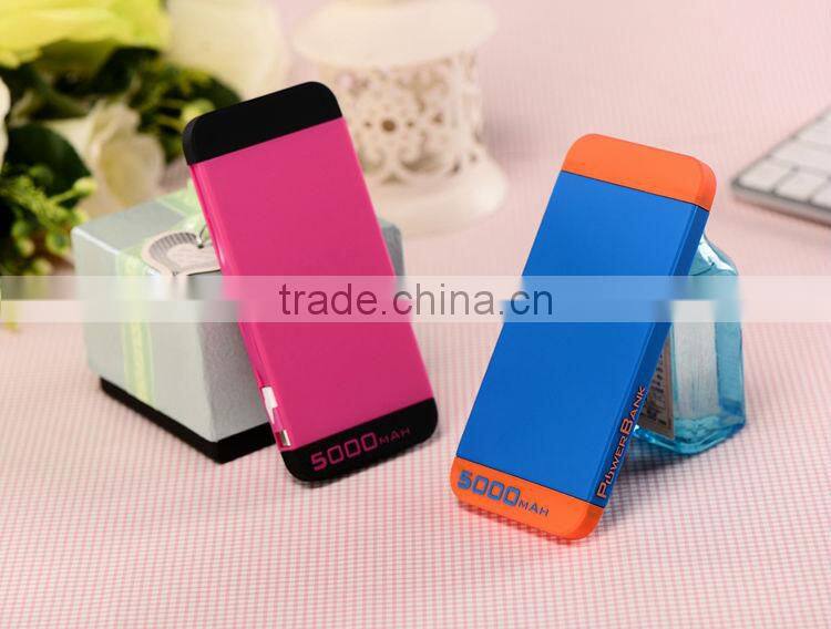 2014 High quality built in cable 5000mah silicon powerbank